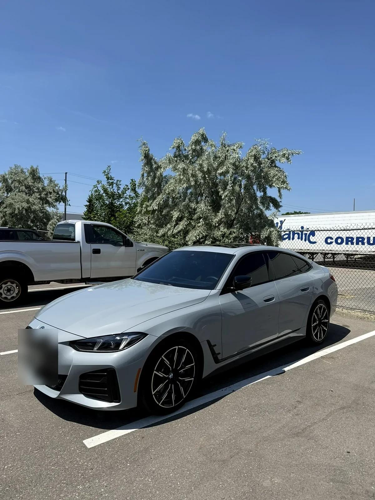 Silver BMW i4 Gran Coupe after a full exterior detail in Mississauga