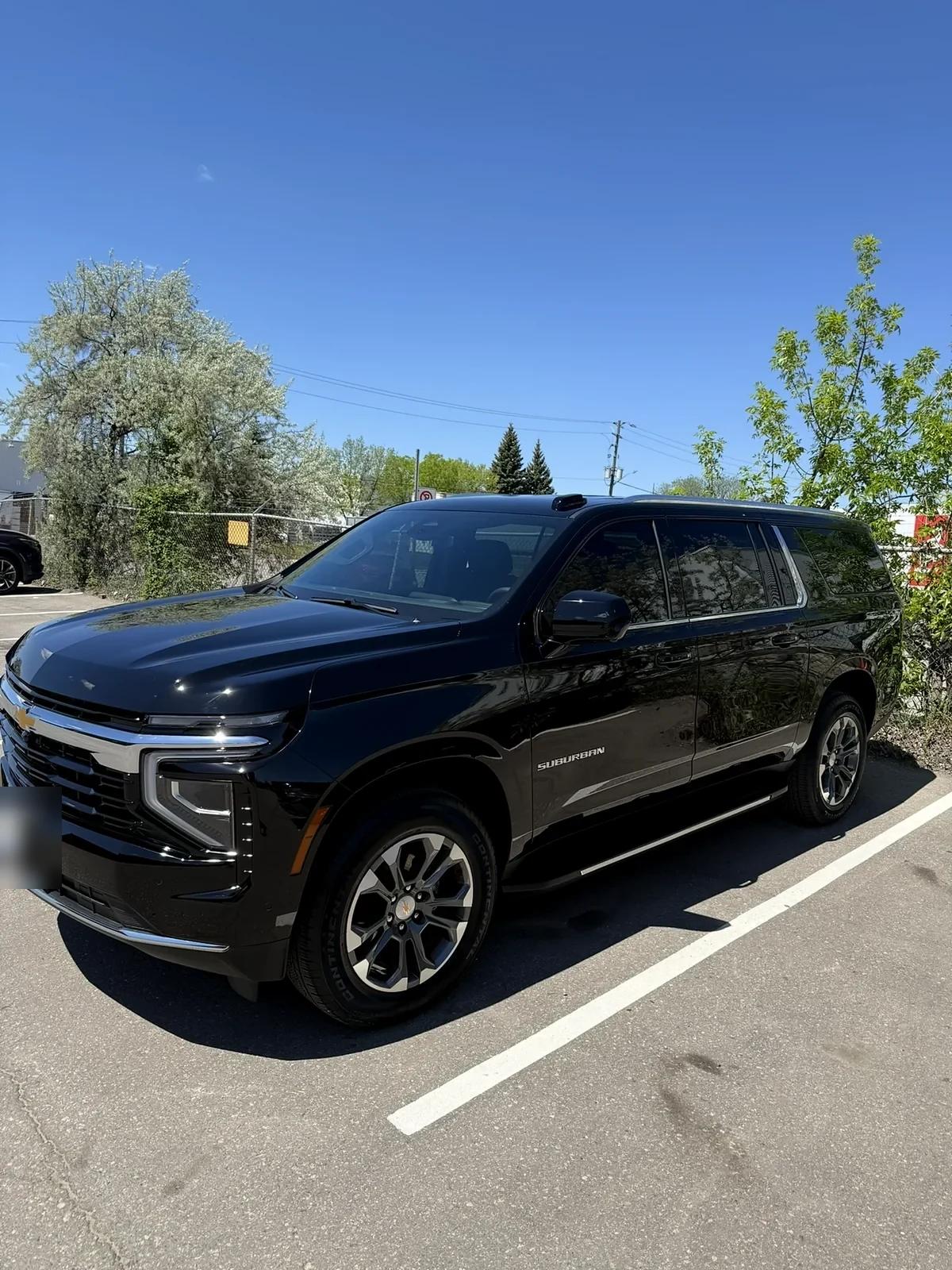 Black Chevrolet Suburban after a full detail at Cosmo Car Customs Mississauga