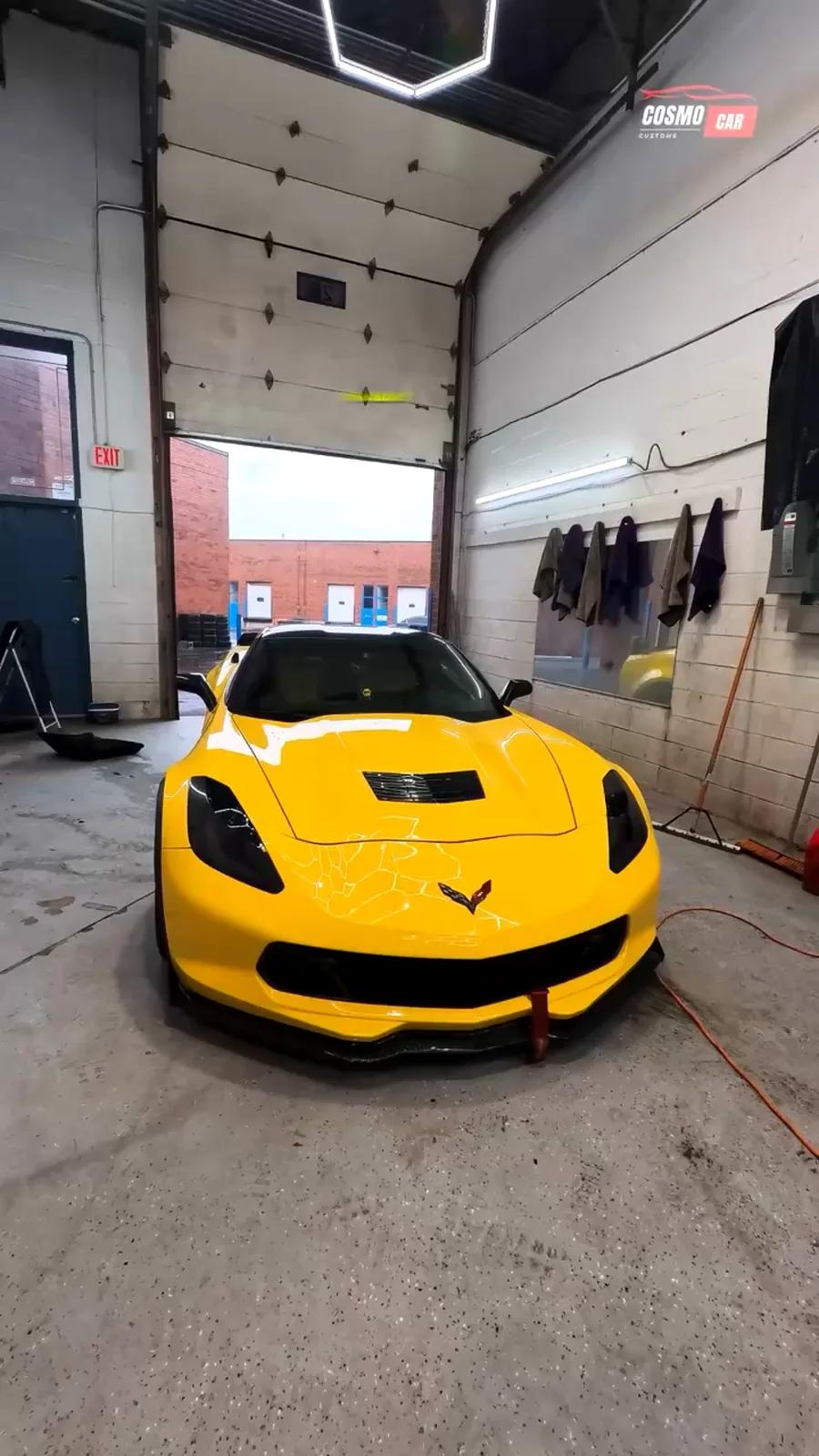 Yellow Chevrolet Corvette Z06 detailed under the hex lighting at Cosmo Car Customs