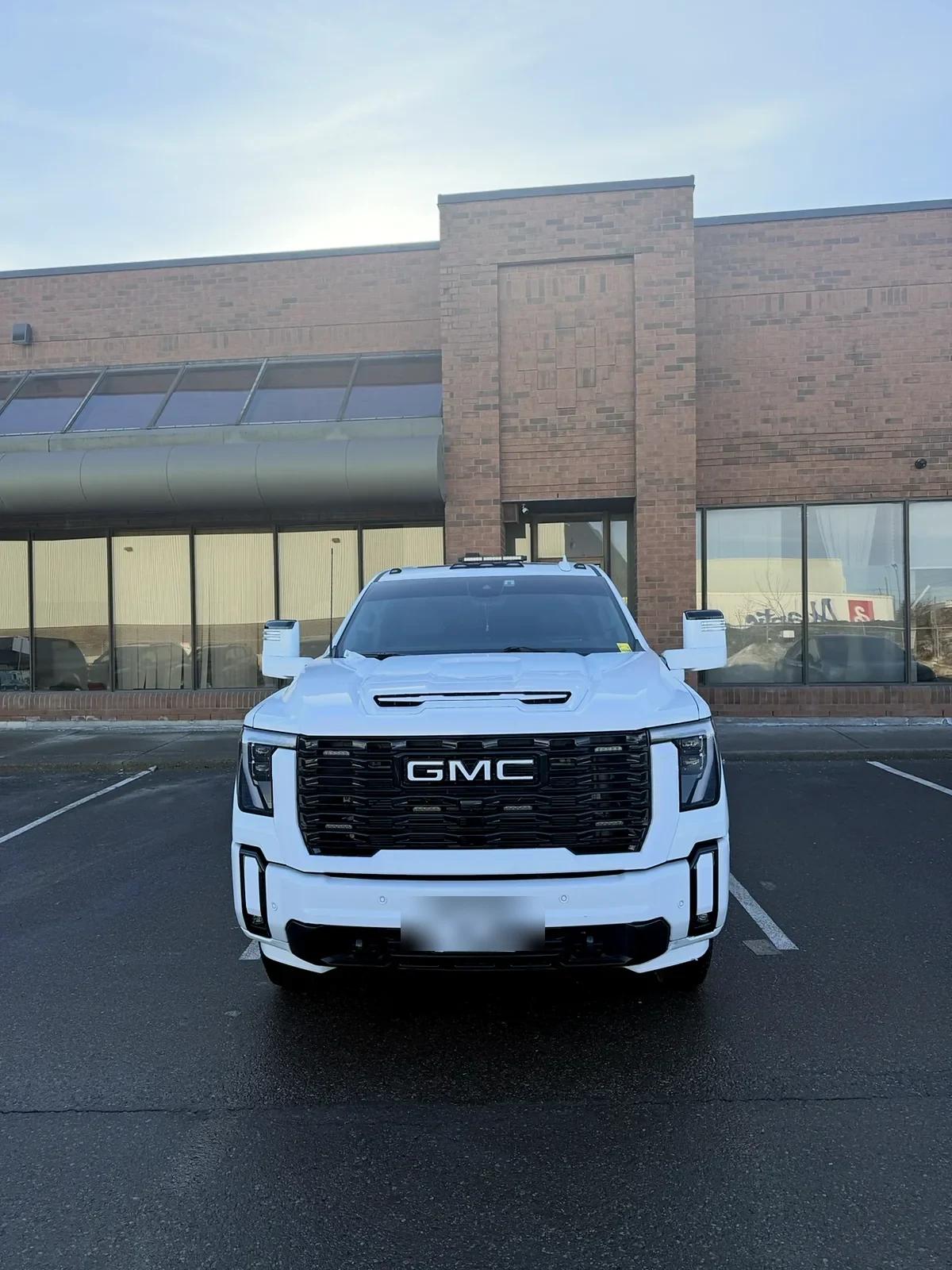 White GMC Sierra Denali detailed at Cosmo Car Customs Mississauga