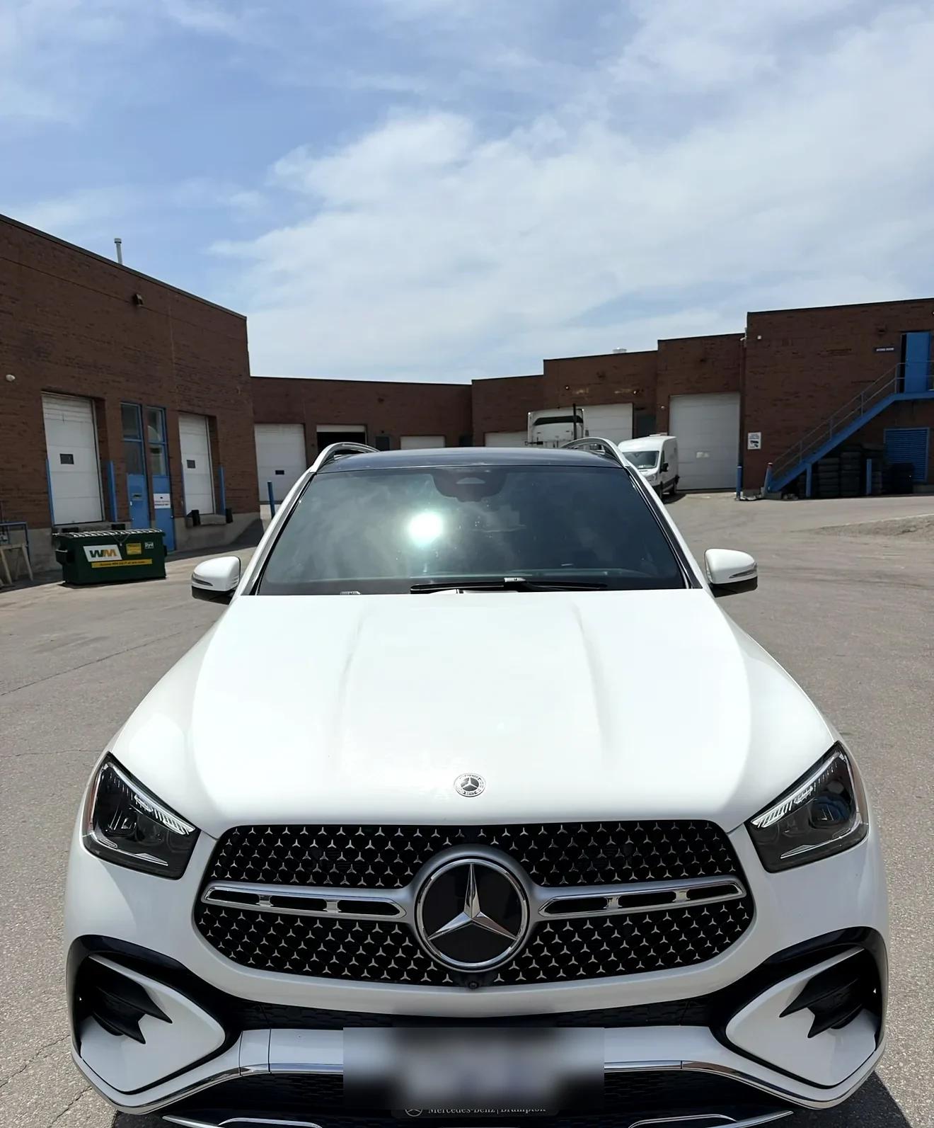 White Mercedes-Benz GLE after a full exterior detail at Cosmo Car Customs