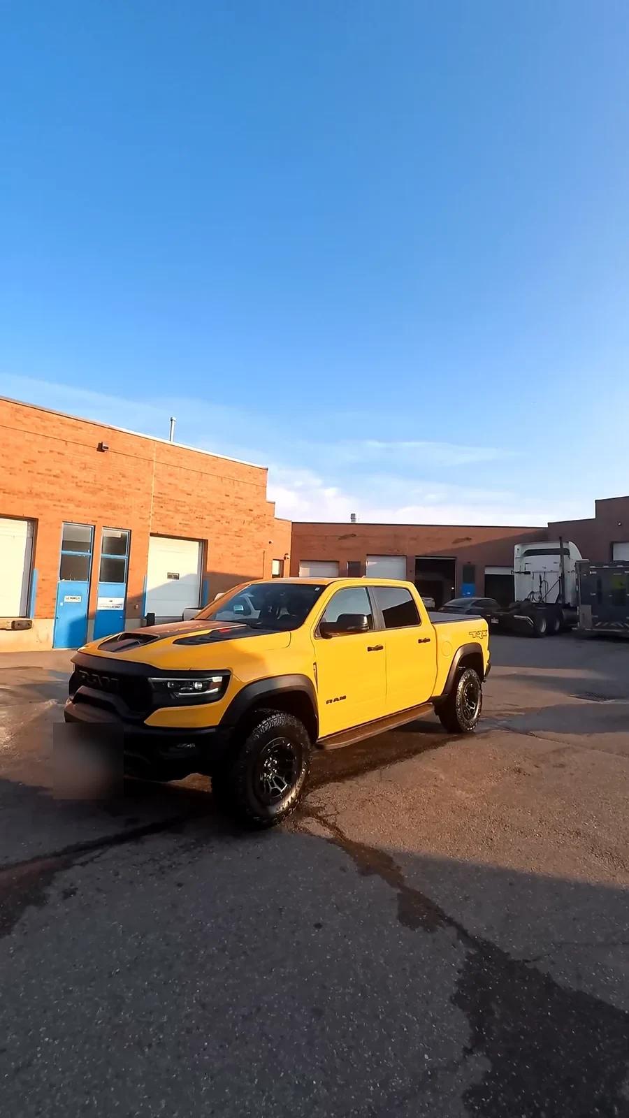 Yellow Ram 1500 TRX pickup detailed at Cosmo Car Customs Mississauga