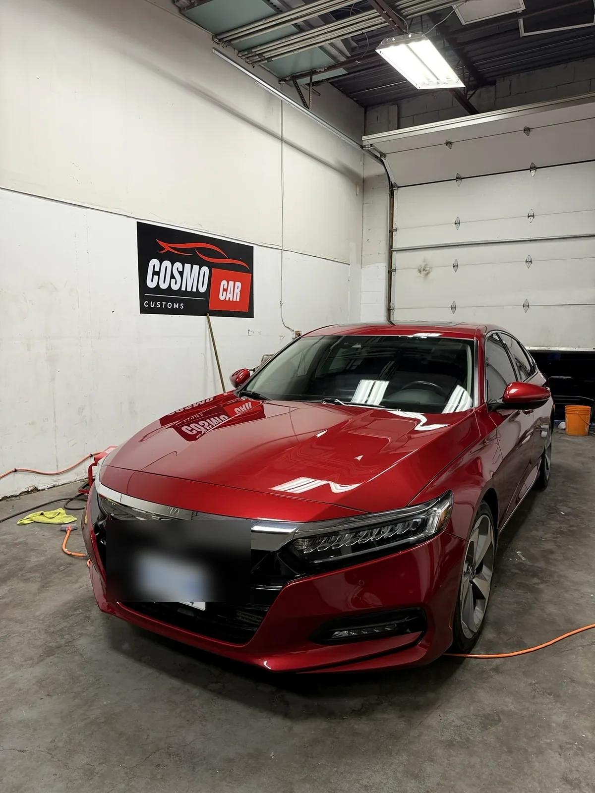 Red Honda Accord after ceramic coating, in the studio
