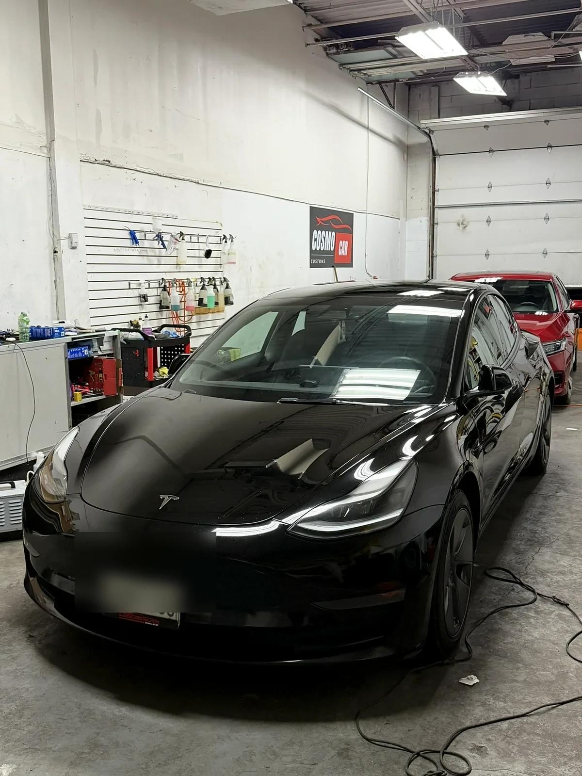 Black Tesla Model 3 after ceramic coating