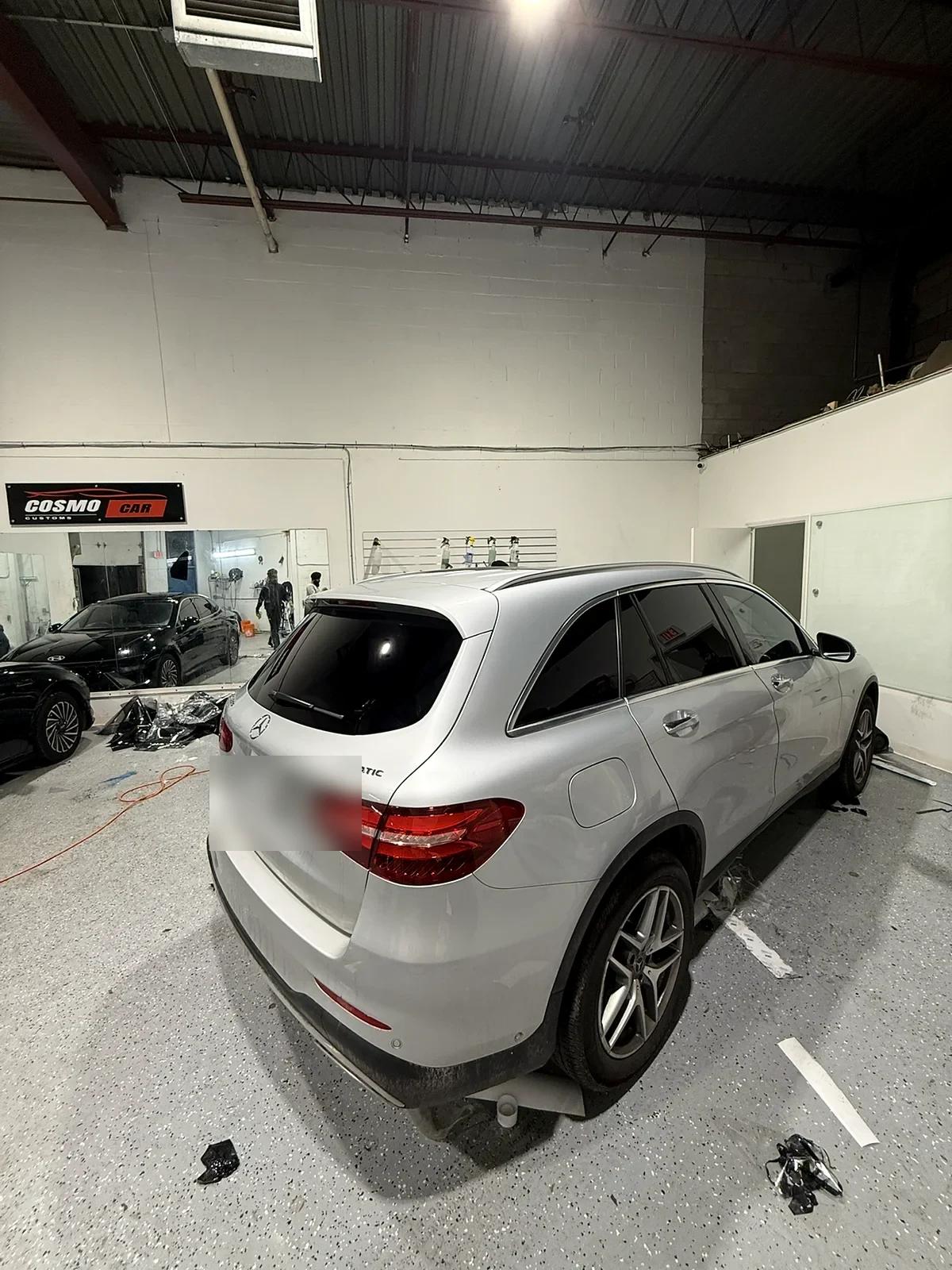 White Mercedes GLC with tinted rear glass in the studio